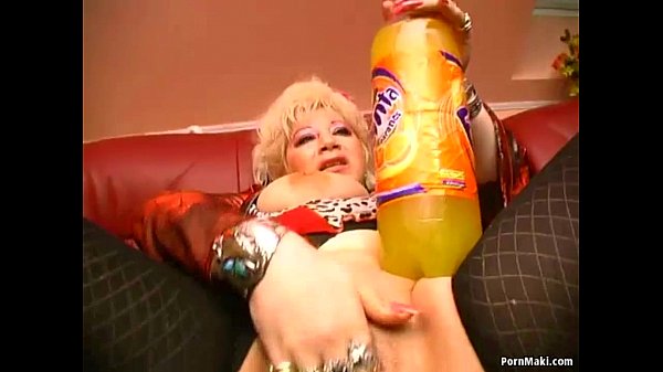 Granny masturbates with huge objects